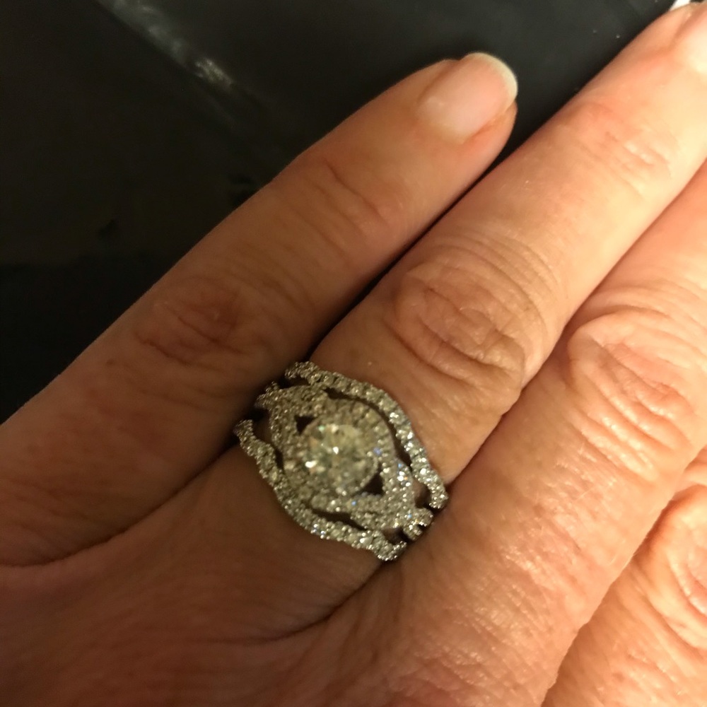 14 kt gold , Over 1 ct total diamond weight.